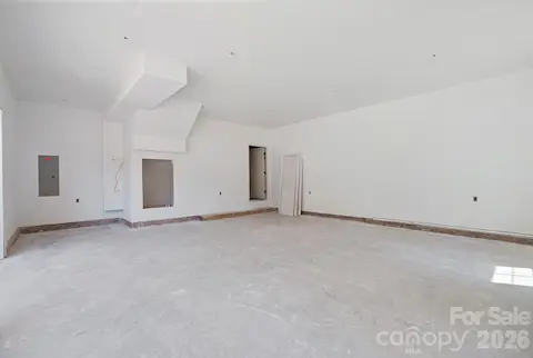 Oversized 2 car garage with enough room for lawn mower/motorcycle, or extras.