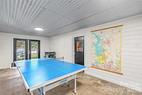 Recreation room with ping pong table