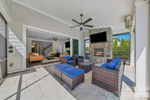 Outdoor Living Space with stone gas fireplace