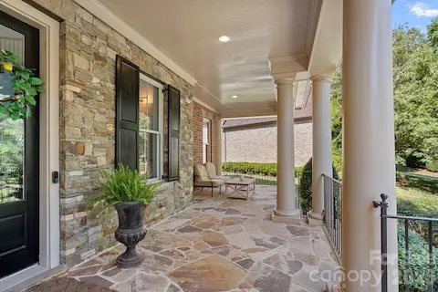 Beautiful front porch made for waving to neighbors.