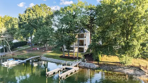 Waterfront, 3 levels of indoor/outdoor living, flat backyard ready for a pool, brand new dock!  You'll love living here.