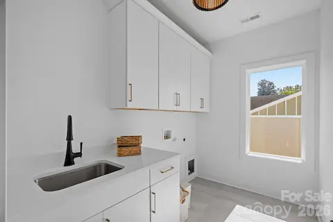 Laundry Room w/ sink & cabinetry