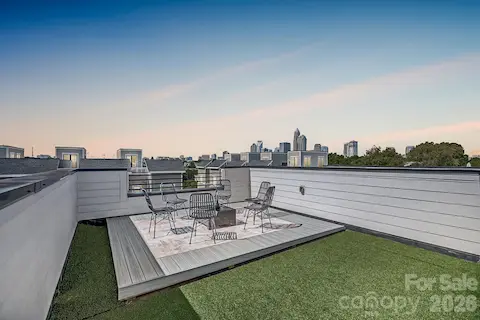 Rooftop terrace at dusk *Photo has been virtually enhanced.*