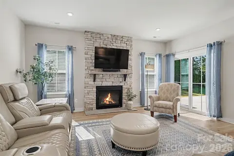 Beautiful fireplace, plenty of natural light