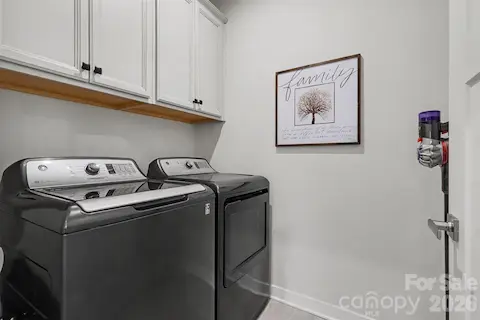 Laundry room with cabinets