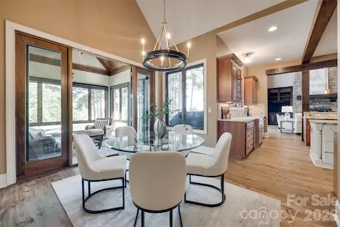Breakfast nook with French doors to the 3 -season room