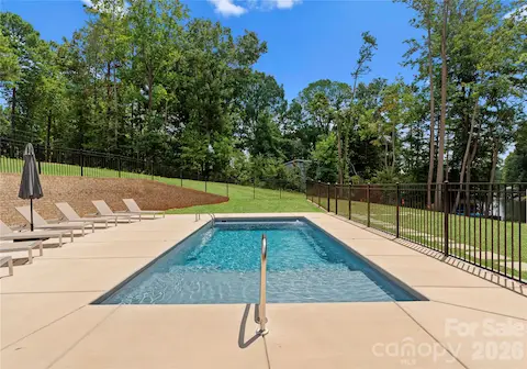 The private pool and surrounding lounge space set the scene for leisurely afternoons at home.