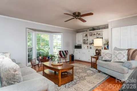 Living room with front bay window